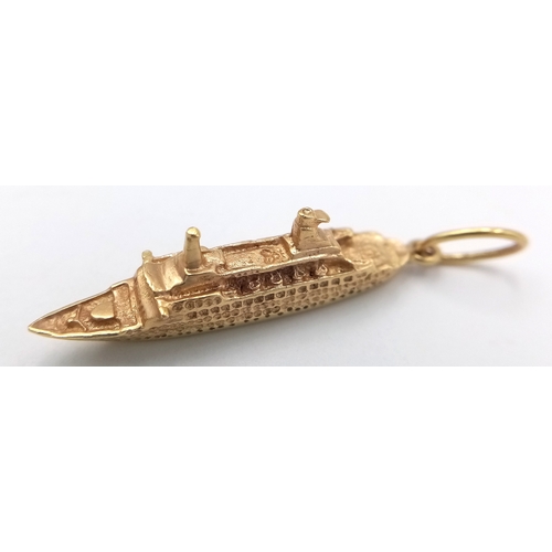 123 - A 14K GOLD CHARM OR PENDANT OF THE CRUISE LINER 
