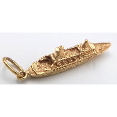 123 - A 14K GOLD CHARM OR PENDANT OF THE CRUISE LINER 