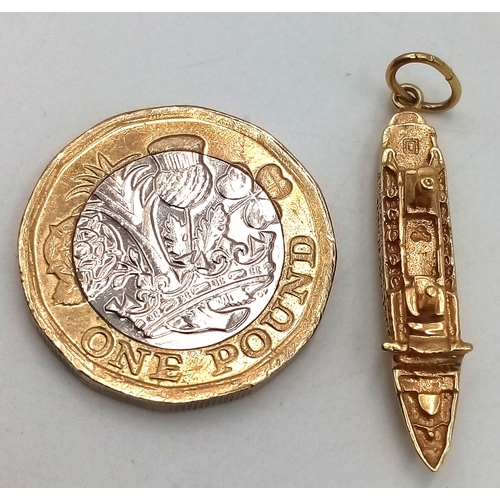 123 - A 14K GOLD CHARM OR PENDANT OF THE CRUISE LINER 