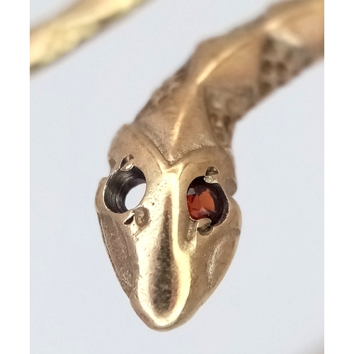 24 - A ONE EYED SNAKE BANGLE (ONE EYE STONE IS MISSING) .    4.76gms