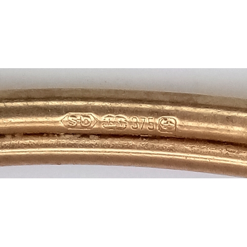 24 - A ONE EYED SNAKE BANGLE (ONE EYE STONE IS MISSING) .    4.76gms