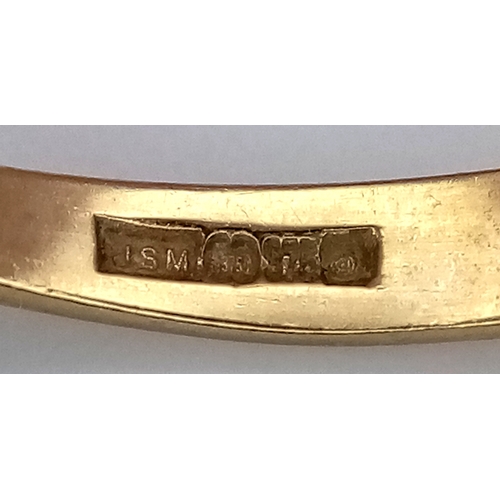 205 - A 9K Yellow Gold Three White Stone Ring. Size O 1/2. 3.6g total weight.