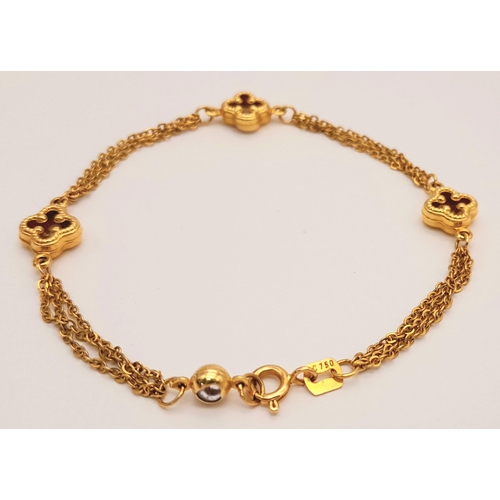 1323 - 18K YELLOW GOLD 2 STRAND CLOVER DESIGN BRACELET 4.2G. REF: TAN 6020