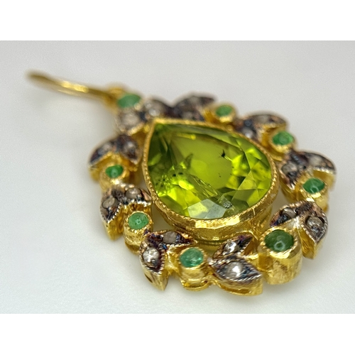 1732 - A Gilt Sterling Silver Pendant with: 1.5ct peridot, 0.12ctw diamonds and 0.18ctw emeralds. 14k gold ... 