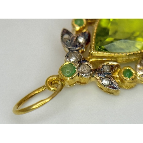 1732 - A Gilt Sterling Silver Pendant with: 1.5ct peridot, 0.12ctw diamonds and 0.18ctw emeralds. 14k gold ... 