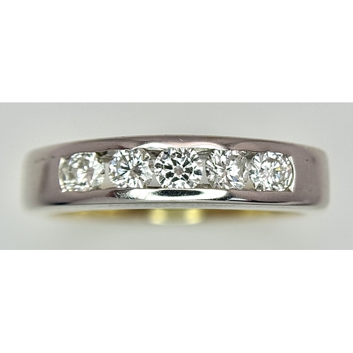 1268 - An 18K Yellow Gold Five Stone Diamond Ring. 0.50ctw of round brilliant cut channel set diamonds. Siz... 
