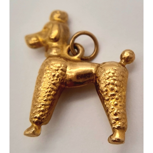 1708 - A 9K YELLOW GOLD POODLE DOG CHARM. 1.2G. SC6019.