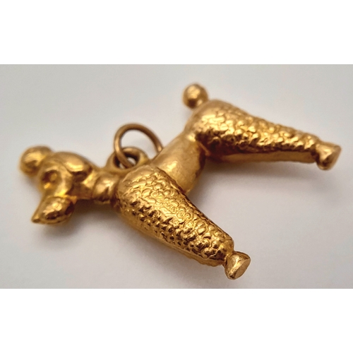 1708 - A 9K YELLOW GOLD POODLE DOG CHARM. 1.2G. SC6019.