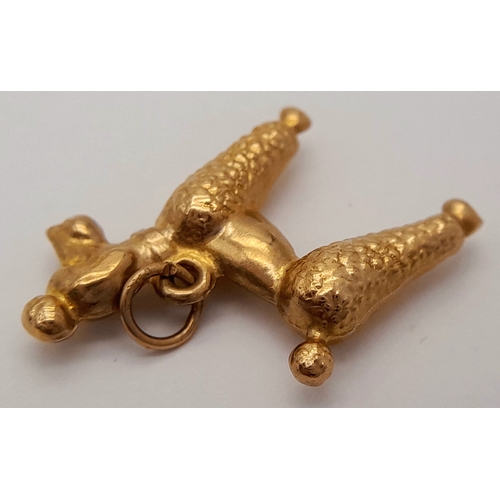 1708 - A 9K YELLOW GOLD POODLE DOG CHARM. 1.2G. SC6019.