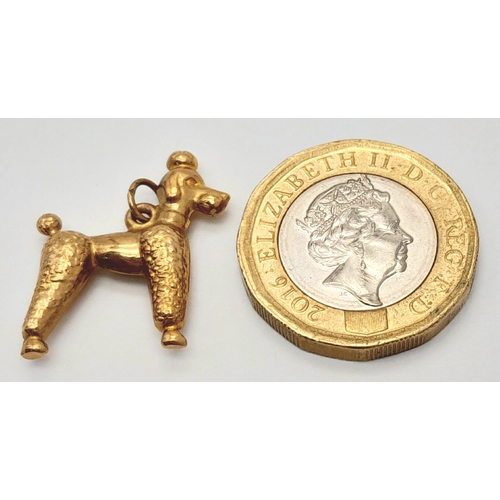 1708 - A 9K YELLOW GOLD POODLE DOG CHARM. 1.2G. SC6019.
