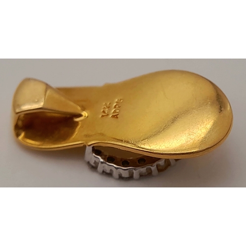 1610 - A 14K YELLOW GOLD DIAMOND SET SANDAL CHARM / PENDANT. 2.3G. SC6050.