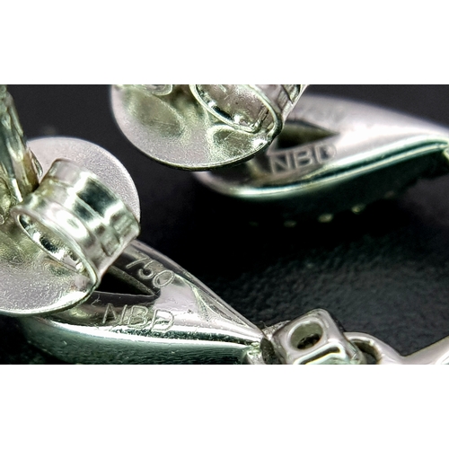 1410 - A Pair of 18K White Gold, Colombian Emerald and Diamond Drop Earrings. Each having a 1ct emerald wit... 
