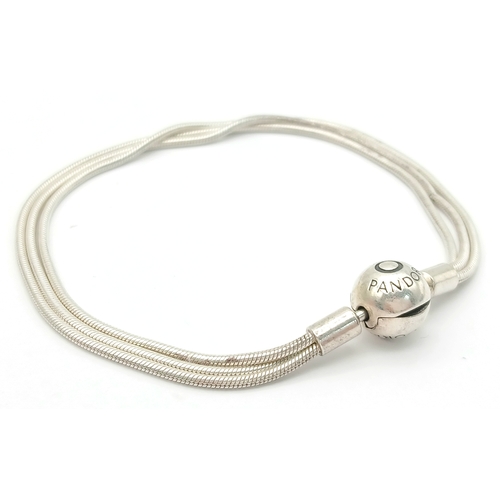 1700 - A PANDORA STERLING SILVER MULTI STRAND BRACELET. 17CM. 10G.