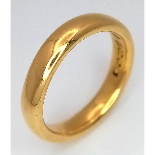 1530 - A 22K Yellow Gold Band Ring. 5mm width. Size M. 7.5g. Full UK hallmarks.