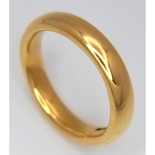 1530 - A 22K Yellow Gold Band Ring. 5mm width. Size M. 7.5g. Full UK hallmarks.