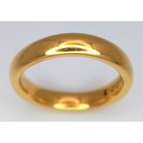 1530 - A 22K Yellow Gold Band Ring. 5mm width. Size M. 7.5g. Full UK hallmarks.