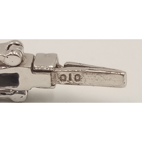 1388 - A 9K WHITE GOLD DIAMOND SET HINGED BANGLE WITH 2 SAFETY CATCHES .     7.7gms