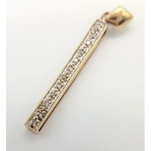 14 - An interesting 9 CARAT GOLD DIAMOND PENDANT with Concealed Slide-Out Ruler reading I LOVE YOU. 2 Gra... 