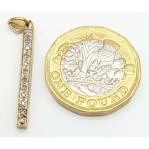 14 - An interesting 9 CARAT GOLD DIAMOND PENDANT with Concealed Slide-Out Ruler reading I LOVE YOU. 2 Gra... 