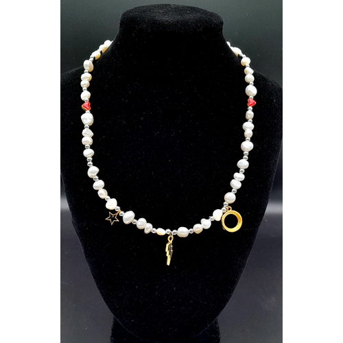 1489 - A pretty Freshwater Pearl link T-bar necklace with enamelled charms. Total length 48cm.