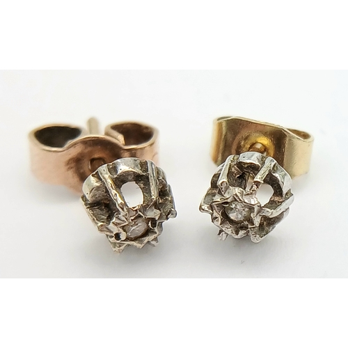 7 - Pair of 9 CARAT GOLD, DIAMOND STUD EARRINGS . Complete With Gold Backs. 0.67 Grams.
