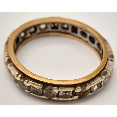 1702 - A Vintage 9K Gold Stone Set Eternity Ring. Size O. 3.5g.