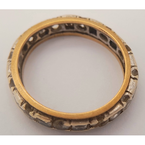 1702 - A Vintage 9K Gold Stone Set Eternity Ring. Size O. 3.5g.