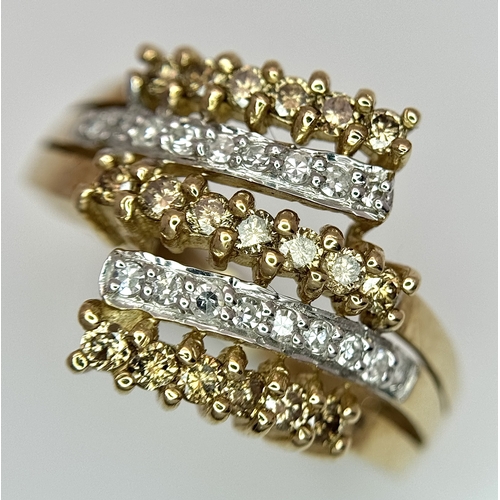 1755 - A 9K Yellow Gold Diamond Crossover Ring. 4.4g total weight. 0.36ctw diamonds. Ring size O. Ref: 7722... 
