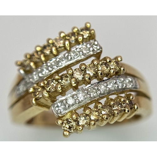 1755 - A 9K Yellow Gold Diamond Crossover Ring. 4.4g total weight. 0.36ctw diamonds. Ring size O. Ref: 7722... 