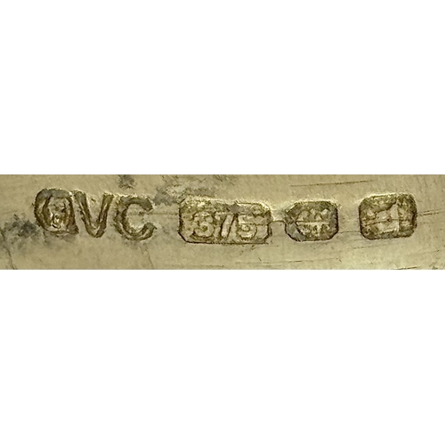 1755 - A 9K Yellow Gold Diamond Crossover Ring. 4.4g total weight. 0.36ctw diamonds. Ring size O. Ref: 7722... 