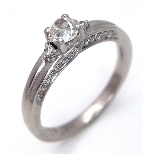 1765 - An 18k white gold diamond trilogy ring with diamond underside, 0.40ct diamond weight, 4.2g total wei... 