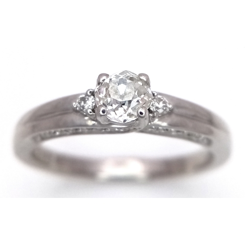 1765 - An 18k white gold diamond trilogy ring with diamond underside, 0.40ct diamond weight, 4.2g total wei... 