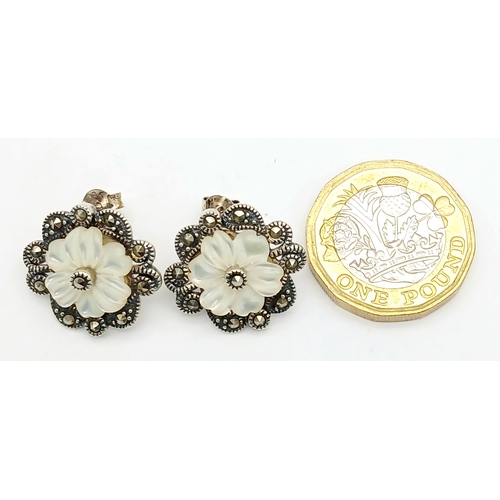 567 - Genuine Pair of ‘HOBBS’  SILVER MARCASITE EARRINGS. Having mother-of-pearl floral detail. complete w... 
