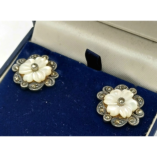 567 - Genuine Pair of ‘HOBBS’  SILVER MARCASITE EARRINGS. Having mother-of-pearl floral detail. complete w... 