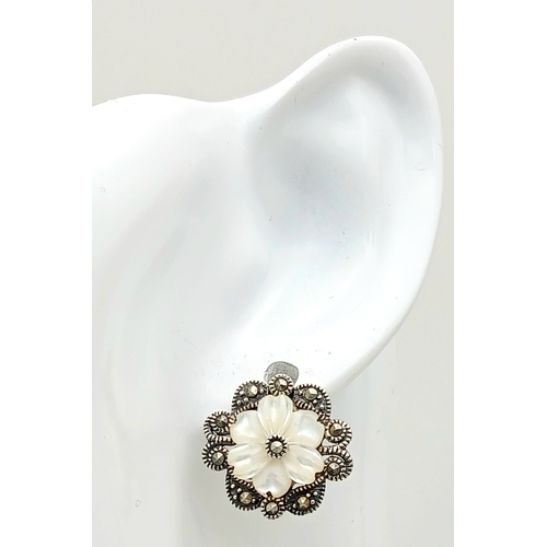 567 - Genuine Pair of ‘HOBBS’  SILVER MARCASITE EARRINGS. Having mother-of-pearl floral detail. complete w... 