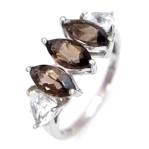648 - A Stylish Sterling Silver Smoky Quartz and White Spinel Ring Size N. The Ring is set with 8mm Long M... 