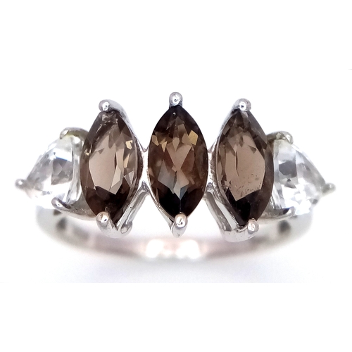 648 - A Stylish Sterling Silver Smoky Quartz and White Spinel Ring Size N. The Ring is set with 8mm Long M... 