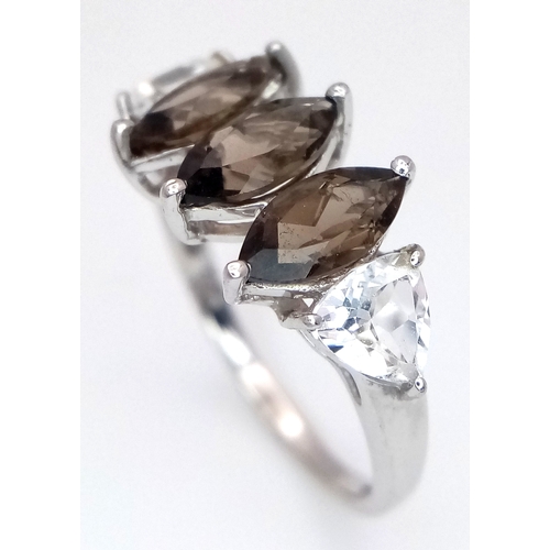 648 - A Stylish Sterling Silver Smoky Quartz and White Spinel Ring Size N. The Ring is set with 8mm Long M... 
