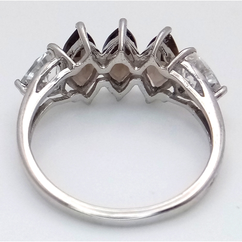 648 - A Stylish Sterling Silver Smoky Quartz and White Spinel Ring Size N. The Ring is set with 8mm Long M... 