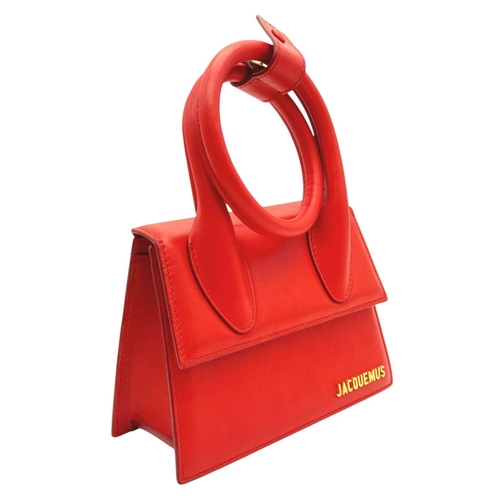 935 - A Jacquemus Le Chiquito Red Leather Mini Handbag. Gold-tone hardware. Single flap closure. Twist han... 