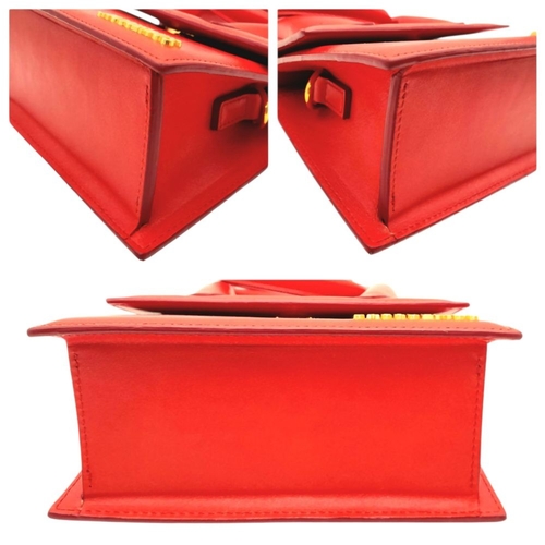 935 - A Jacquemus Le Chiquito Red Leather Mini Handbag. Gold-tone hardware. Single flap closure. Twist han... 