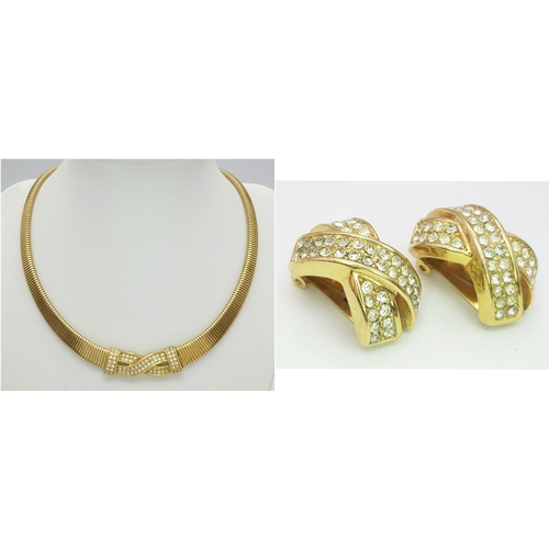 949 - A Christian Dior Designer Accessory Choker Necklace and Earring Set. Gilded and white stone decorati... 