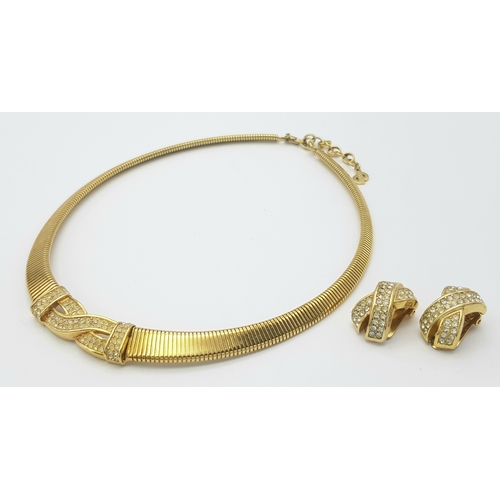 949 - A Christian Dior Designer Accessory Choker Necklace and Earring Set. Gilded and white stone decorati... 