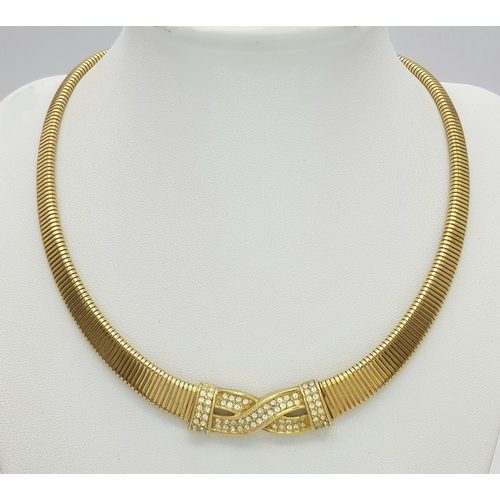 949 - A Christian Dior Designer Accessory Choker Necklace and Earring Set. Gilded and white stone decorati... 