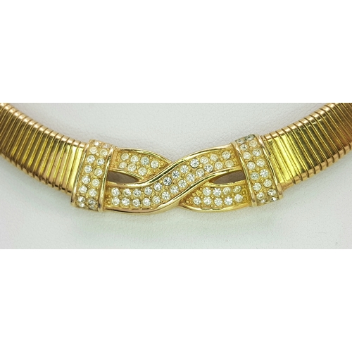 949 - A Christian Dior Designer Accessory Choker Necklace and Earring Set. Gilded and white stone decorati... 