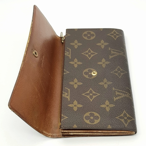 977 - A Louis Vuitton Rectangular Monogram Canvas Wallet. 19cm width x 10cm height. STK025471
