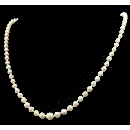 1213 - A Vintage Cultured Pearl Necklace. Sterling silver clasp. 54cm length. STK025060