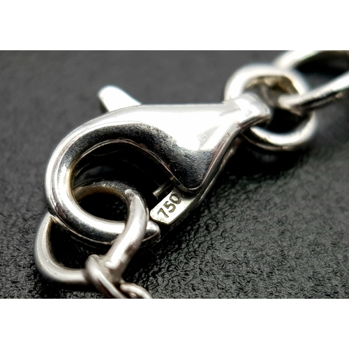 1269 - An Angelic 18K Gold, Tahitian Pearl and Black Onyx Pendant on an 18K White Gold Fancy Chain. Pendant... 