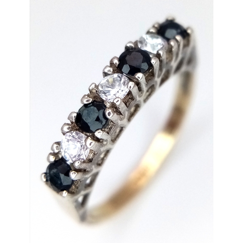 1719 - A 9K Gold and Silver, Sapphire and White Stone Ring. Size L. 2.1g. Ref: 8.14