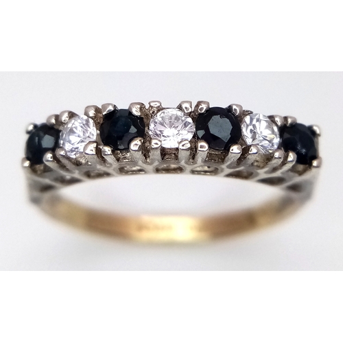 1719 - A 9K Gold and Silver, Sapphire and White Stone Ring. Size L. 2.1g. Ref: 8.14